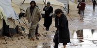 洪水により、苦境にさらされているヨルダン難民キャンプの人びと。(C) AFP/Getty Images