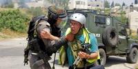 Bilal Tamimi being attacked by an Israeli soldier at a protest in Nabi Saleh in May 2013. (C) Tamimi Press