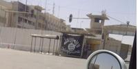 イラク・シリアのイスラム国（ISIS）がモスル市内に立てたジハード（聖戦）の黒い旗 (C)Amnesty International