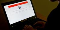 A laptop displays a denial of access message for a website blocked in Beijing. (C)STF/AFP/Getty Images