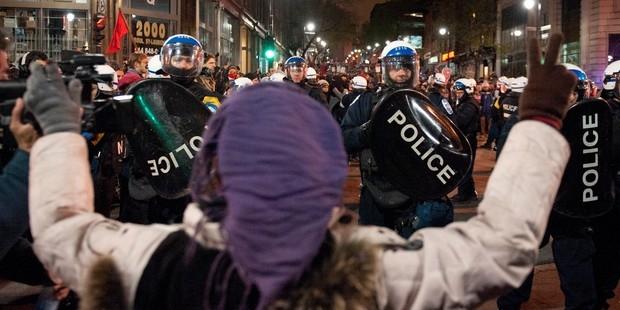 A repressive law passed amid massive protests in Quebec poses a threat to basic freedoms. © ROGERIO BARBOSA/AFP/GettyImages 