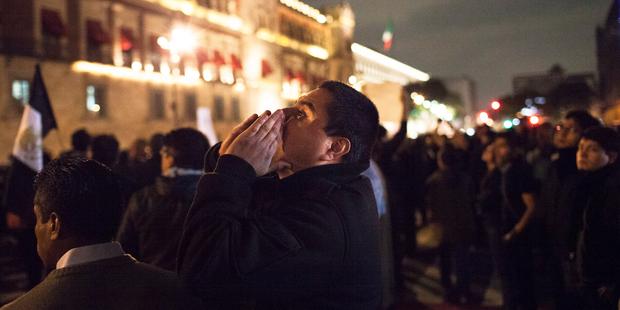 Mexicans protesting at the disappearance of 43 students in Iguala, Guerrero.(C)Brett Gundlock/Getty Images