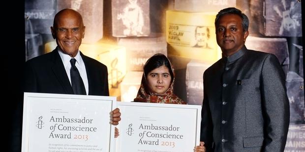 Harry Belafonte and Malala Yousafzai at the Ambassador of Conscience Award ceremony with Amnesty International Secrretary General Salil Shetty. 